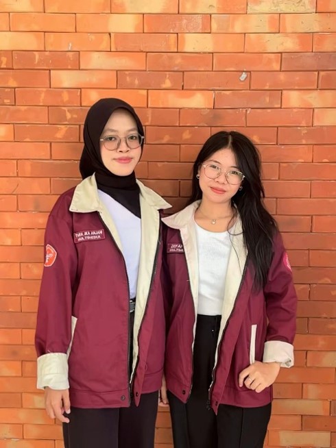 Gambar Tiara Ika Anjani bersama rekannya Zefanya mewakili Fakultas Hukum Universitas Jambi dalam Ajang Lomba ANLWC 2026
